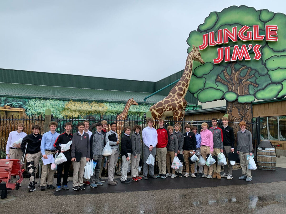 students in front of Jungle Jims